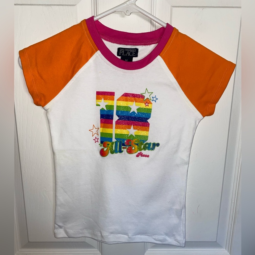 $1.00 with additional purchase Girls top